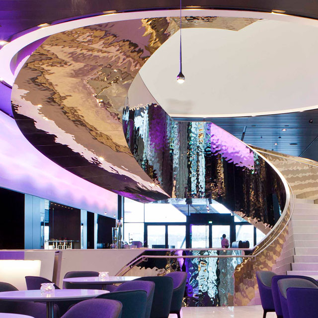 Vienna, Hotel Melia Vienna in DC Tower 1, Restaurant with Self Supporting Spiral Stair, Interior Work SFL, Cladding EXYD-M, Gold Colored, Foto Walter J. Sieberer, 2014